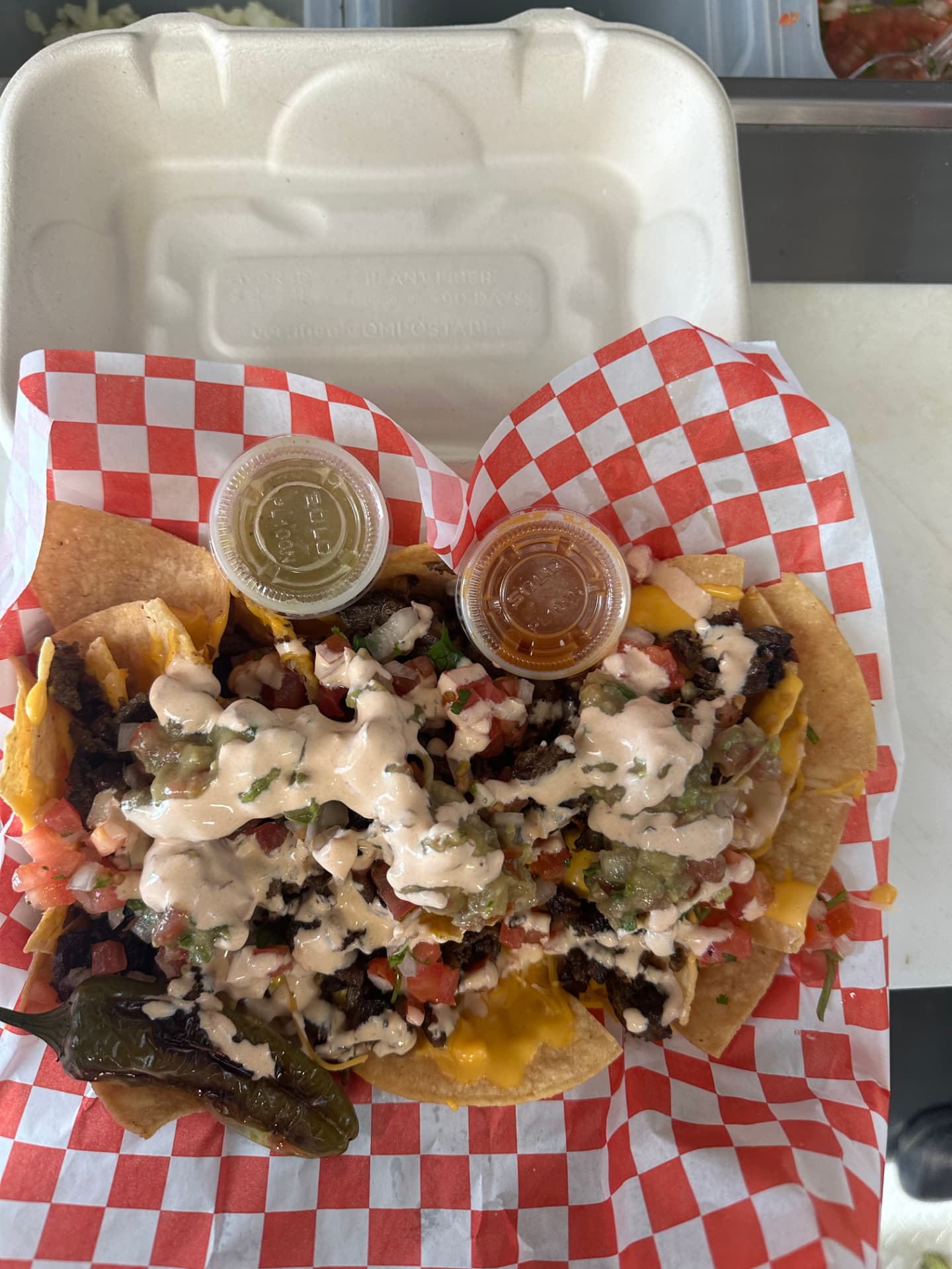 Carne asada burrito with fries from Dos Tacos Y Mas